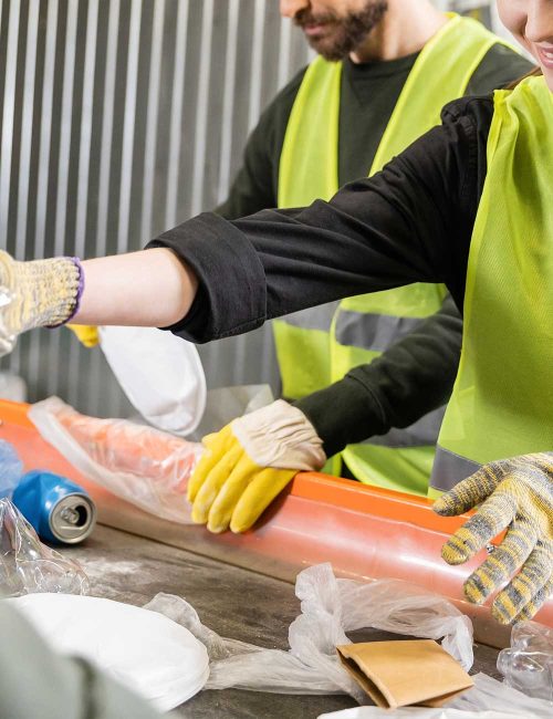 positive-worker-in-protective-gloves-and-reflectiv-VTRWRN4.jpg